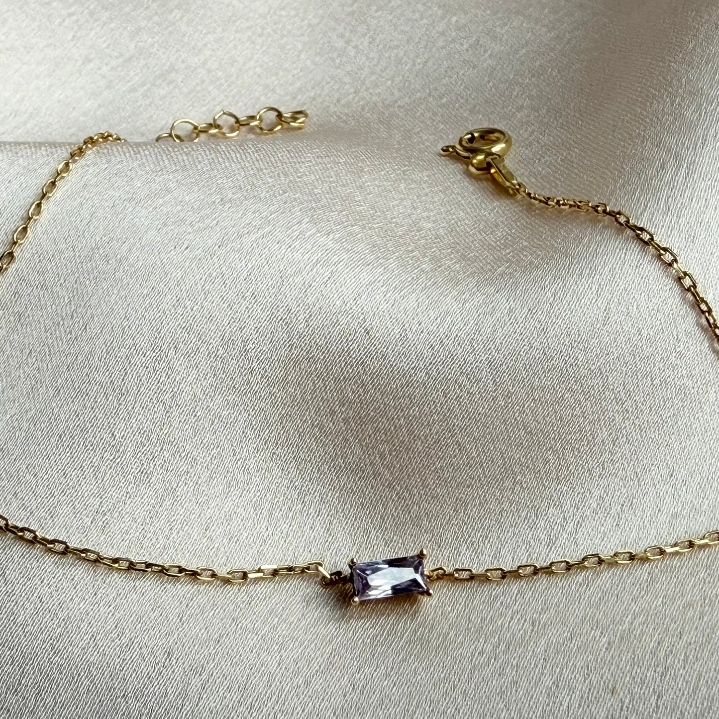 Gold bracelet with a rectangular shaped alexandrite cz crystal birthstone
