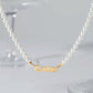 gold pearl name necklace